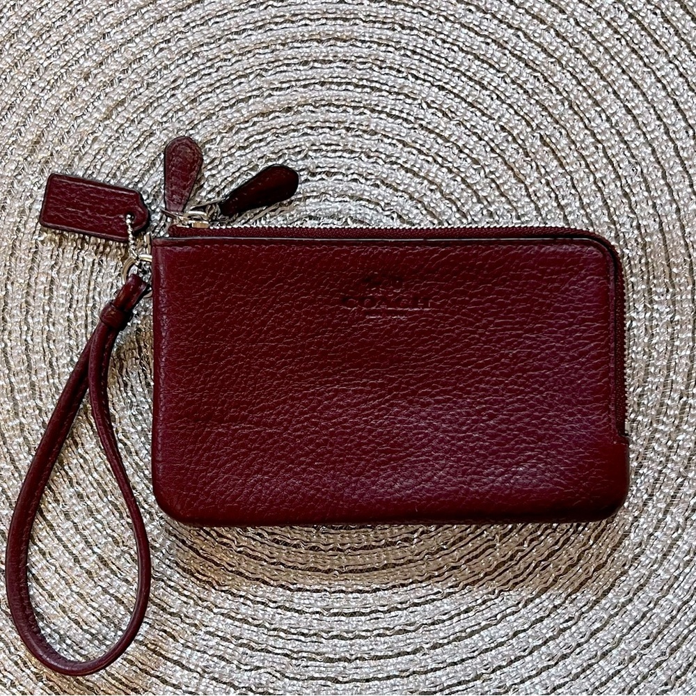 COACH Elegant Burgundy Double Zip Leather Wristlet